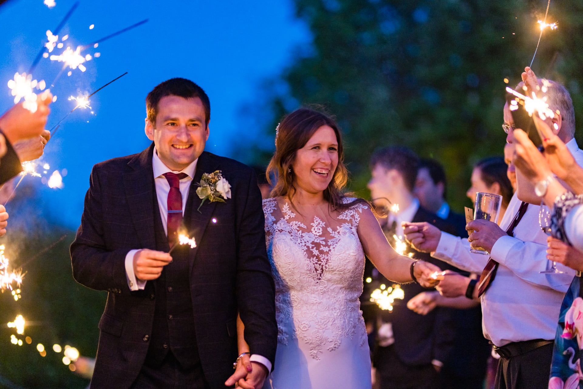 Wedding couple sparklers sunset at Priston Mill Wedding Venue