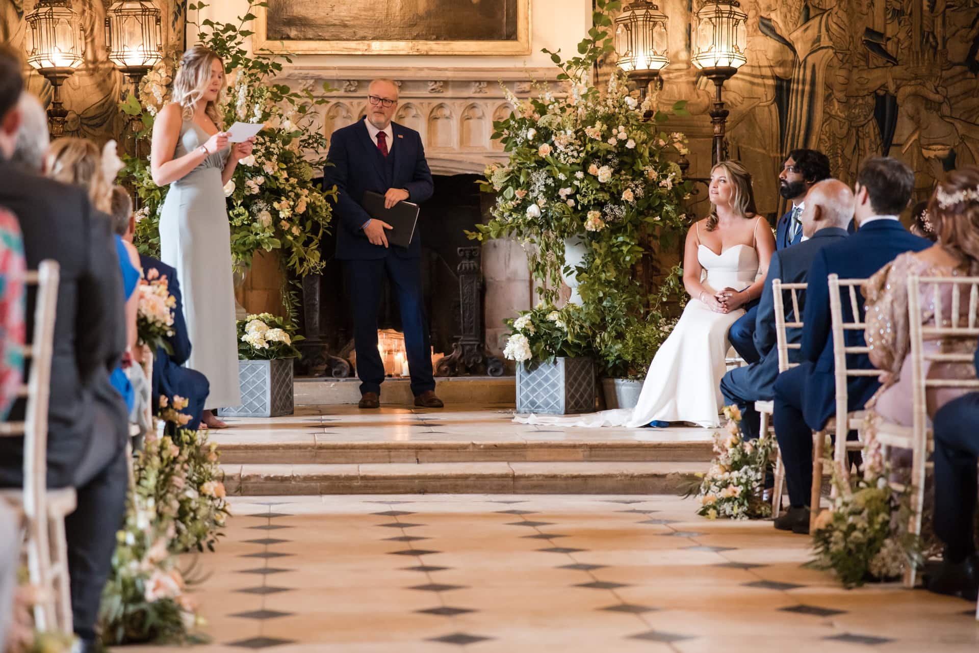 Bridesmaid speech during ceremony, with Bride and Groom listening at the Berkeley Castle Wedding Venue