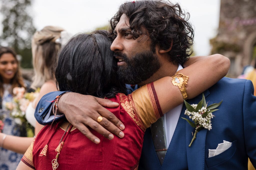 Groom being congratulated