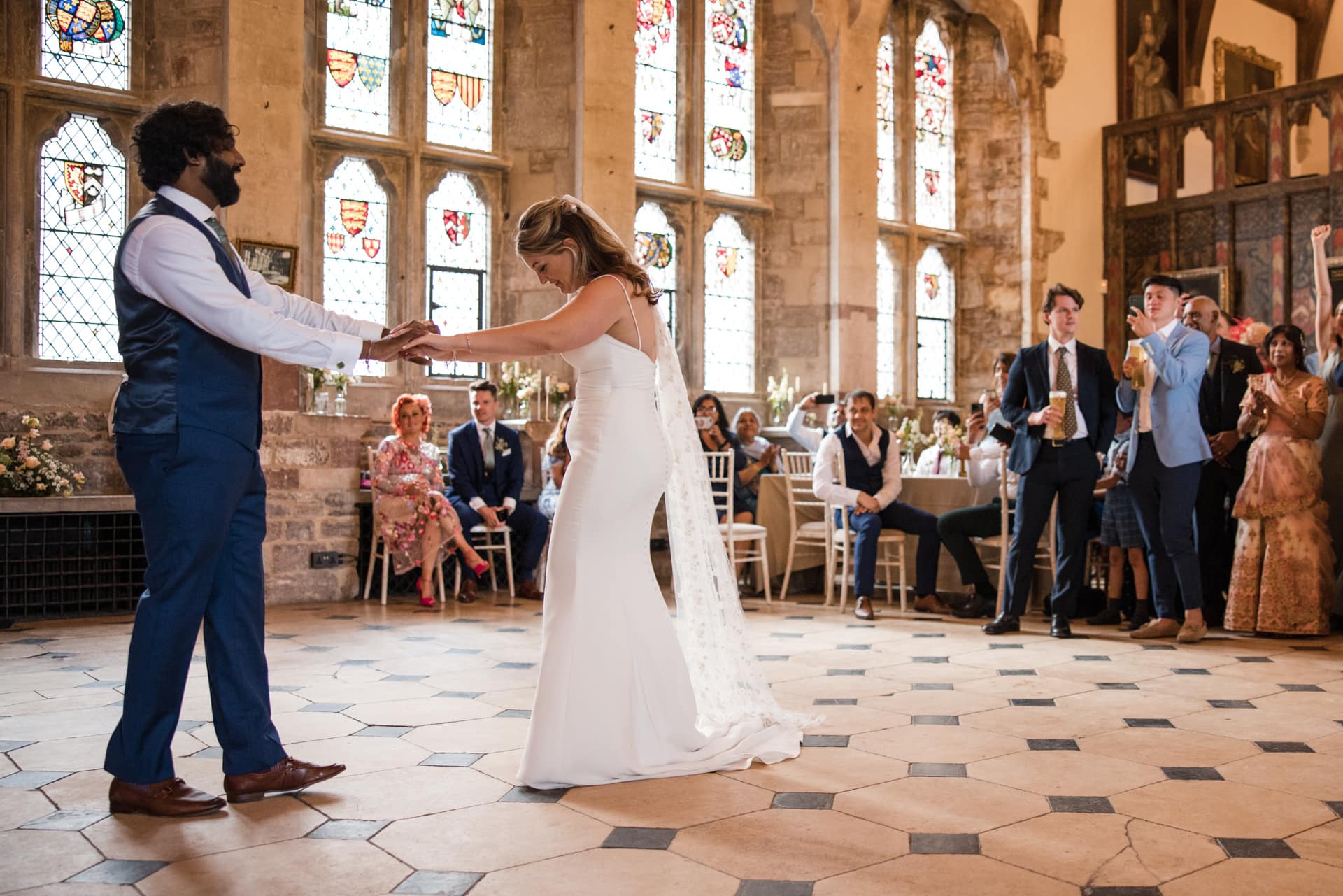 Bride and Groom first dance in big stately hall