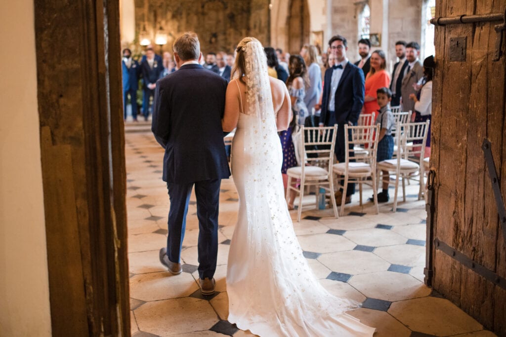 Father and Bride walking into hall for ceremony