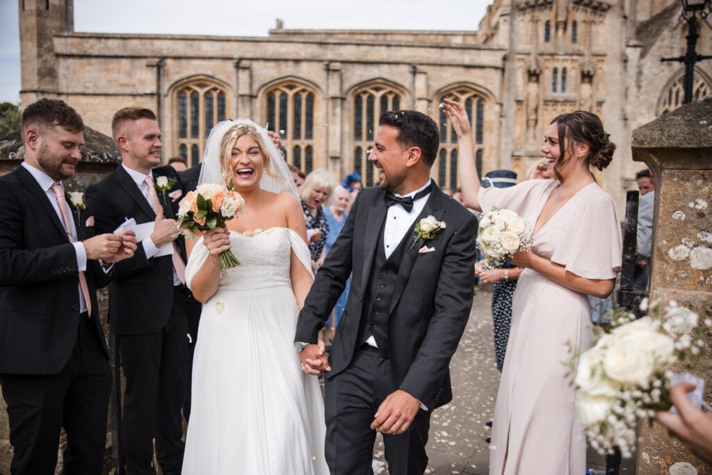 Bride and Groom confetti shot outside church