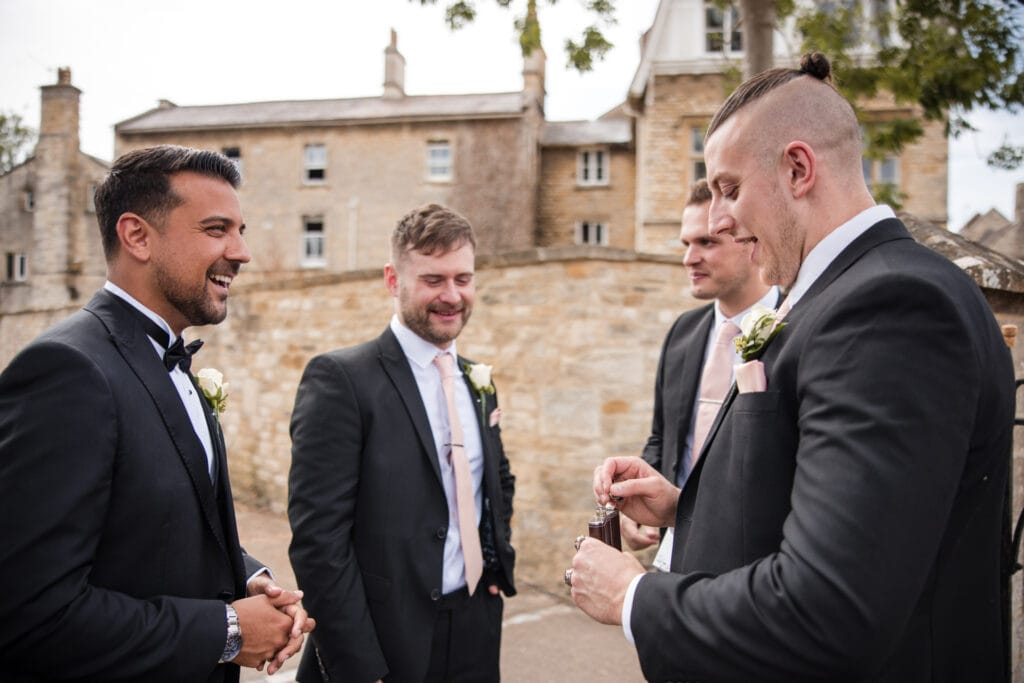 Groom and Groomsmen with hip flask