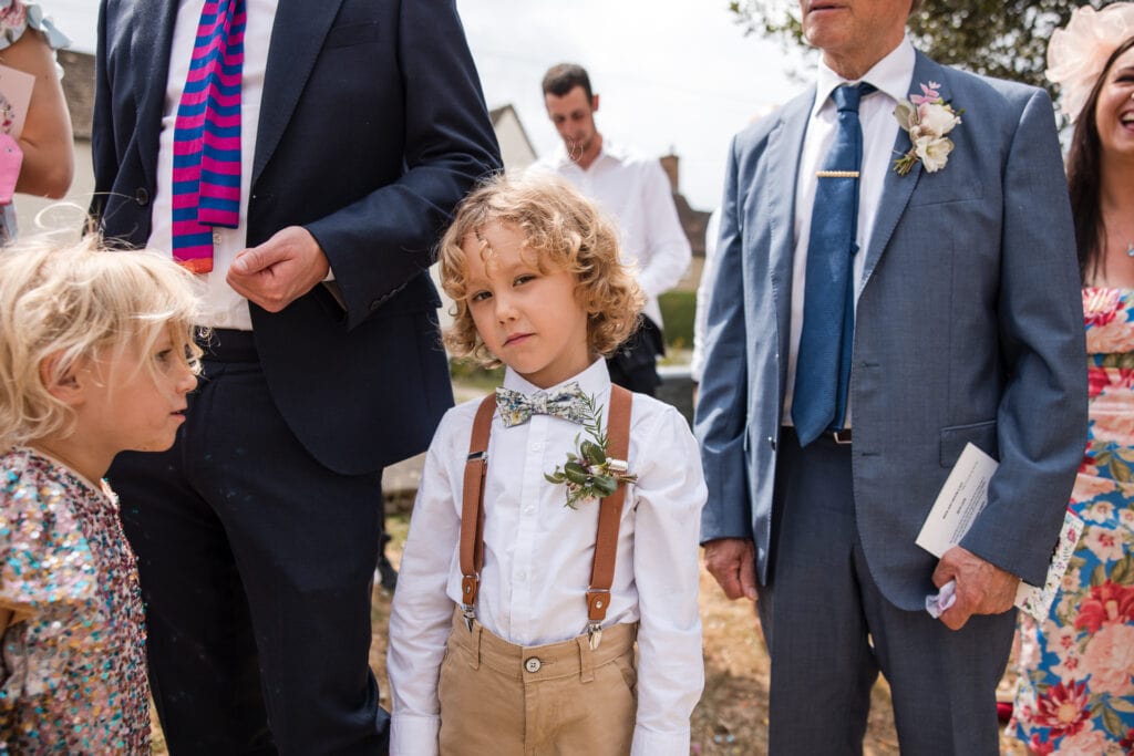 The son of the bride and groom dressed smart