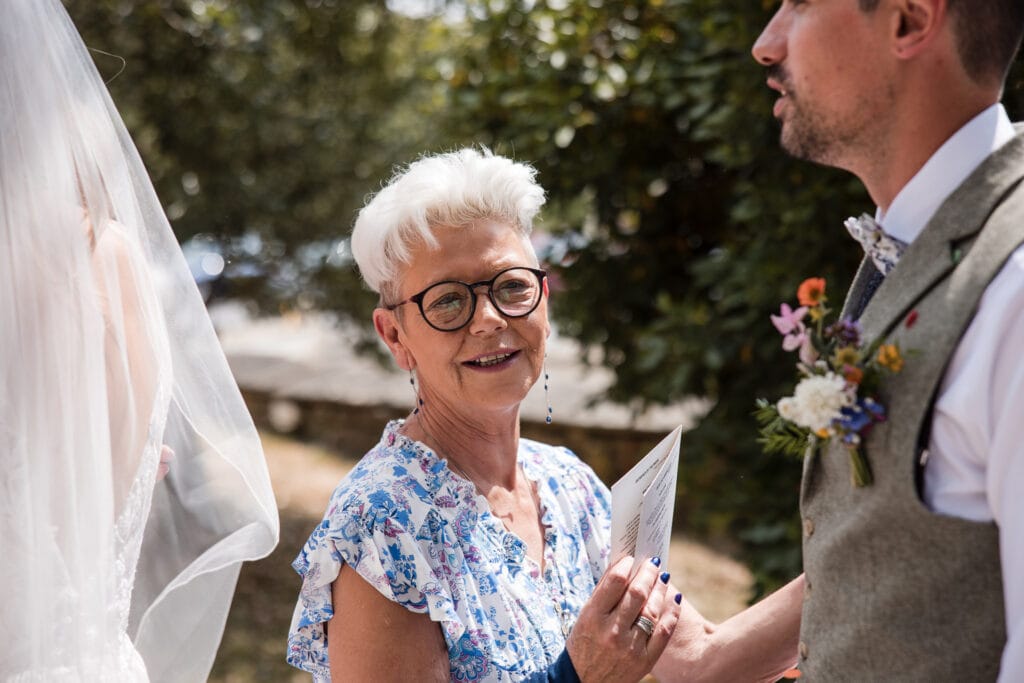Guests enjoying a minute with the bride and groom