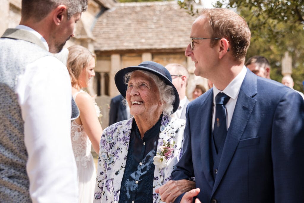 older generations enjoying talking to the groom