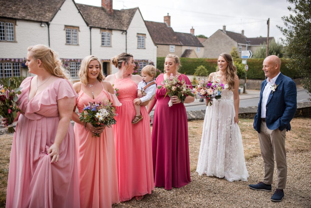 Bride and Bridesmaids at All Saints Church, Sutton Benger