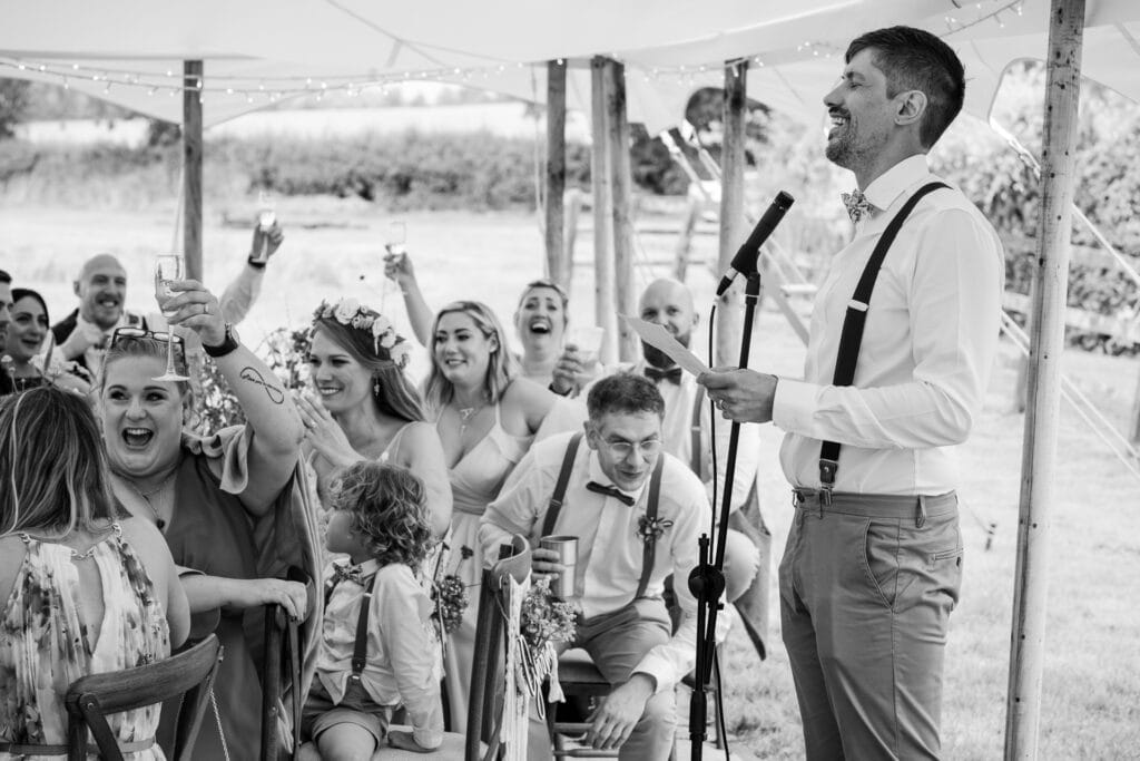Groom speech in the Marquee B&W