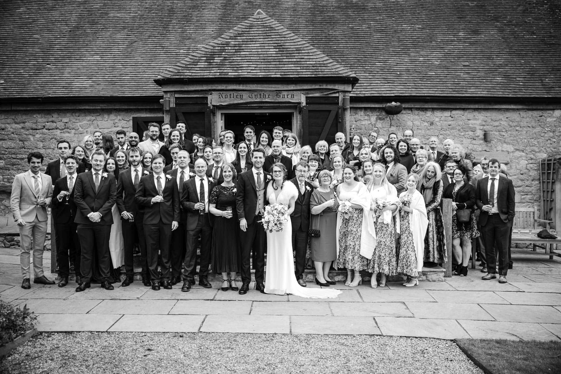 Group photo out the front of Notley Tythe Barn