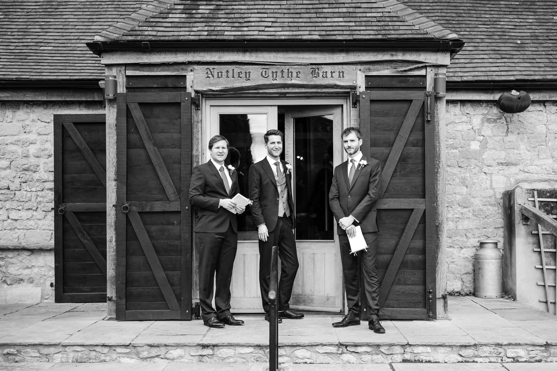 Ushers and Groom outside of the Notley Tythe Barn