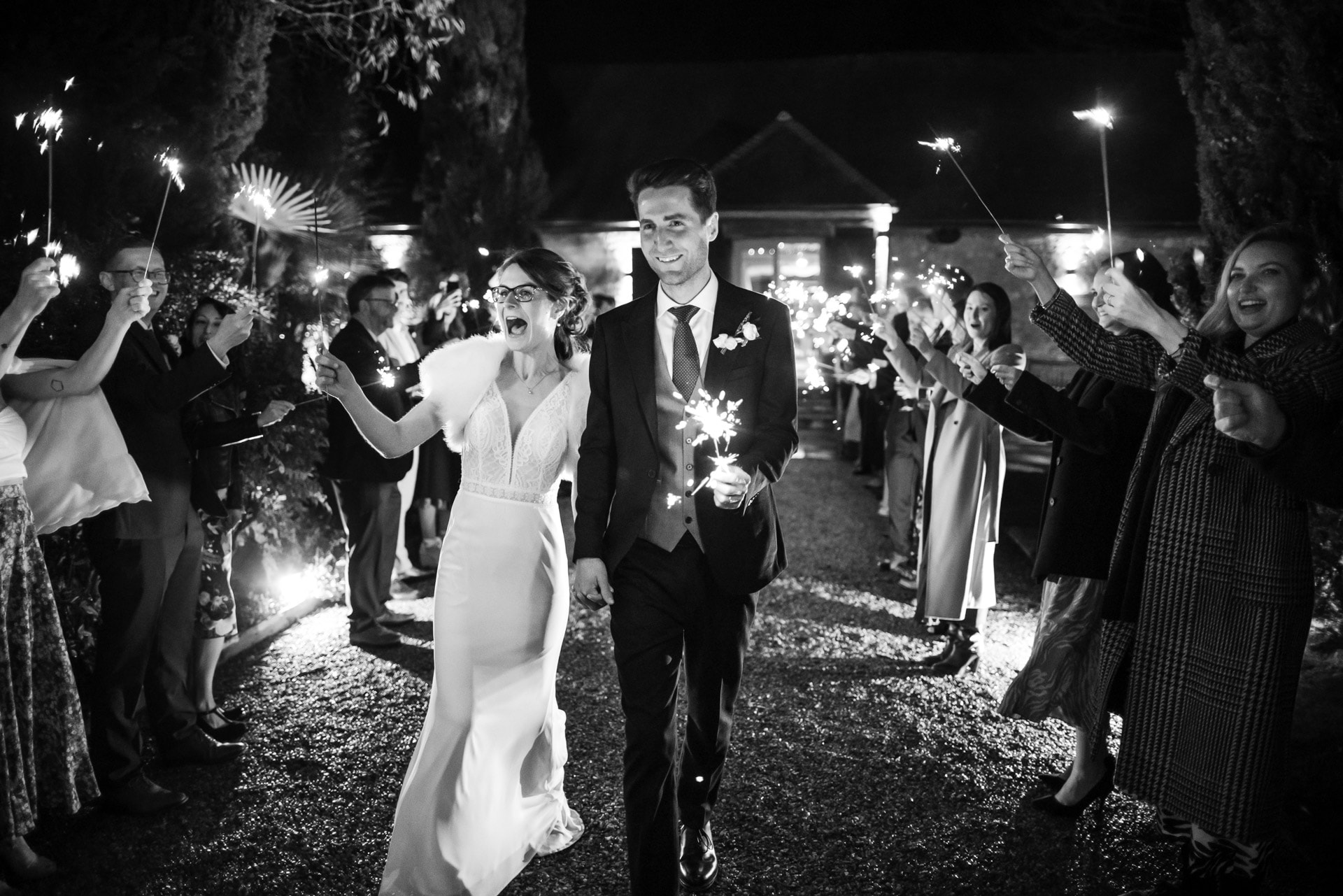 Bride and Groom sparklers shot outside Notley Barn