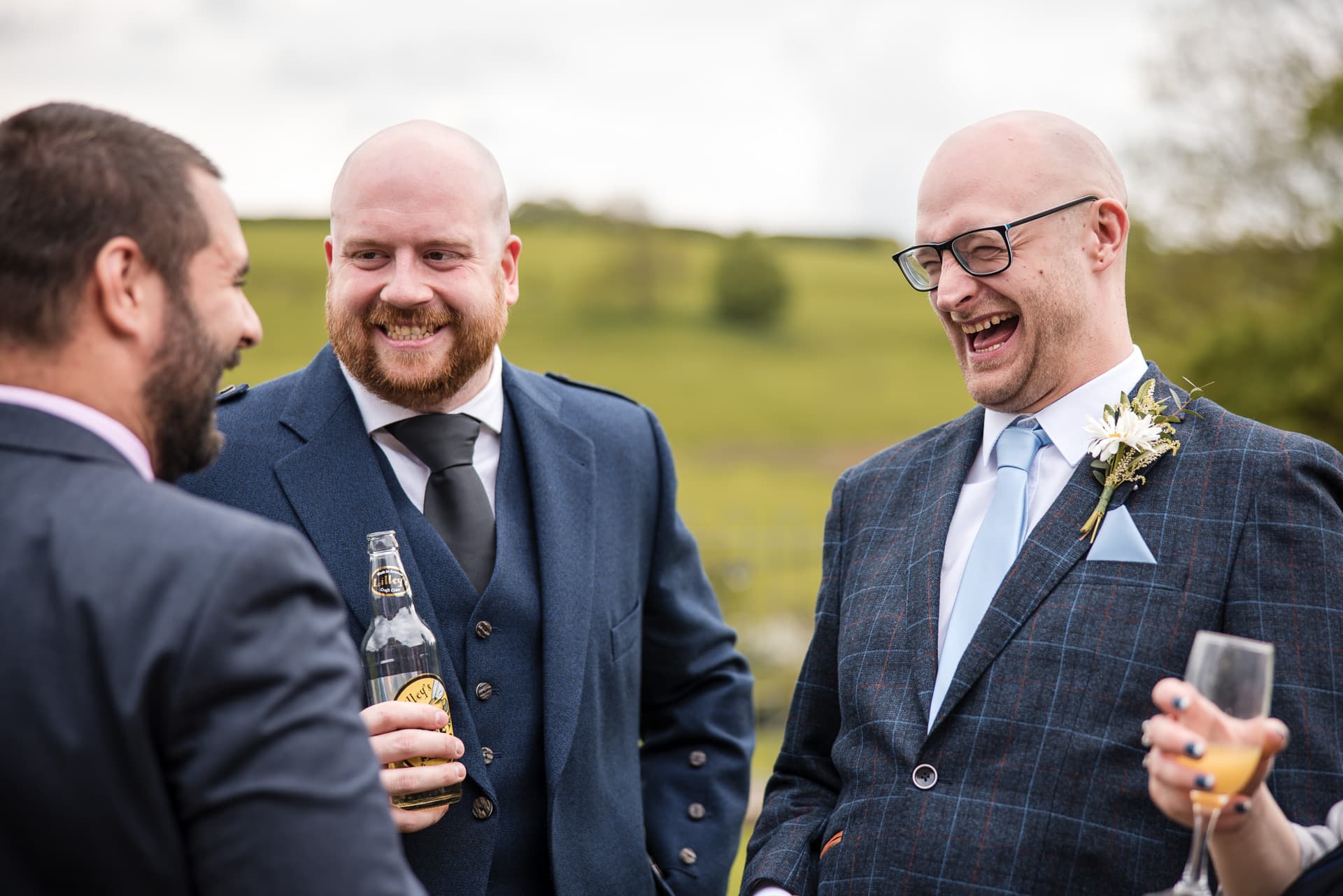 Groomsman and friends having a laugh