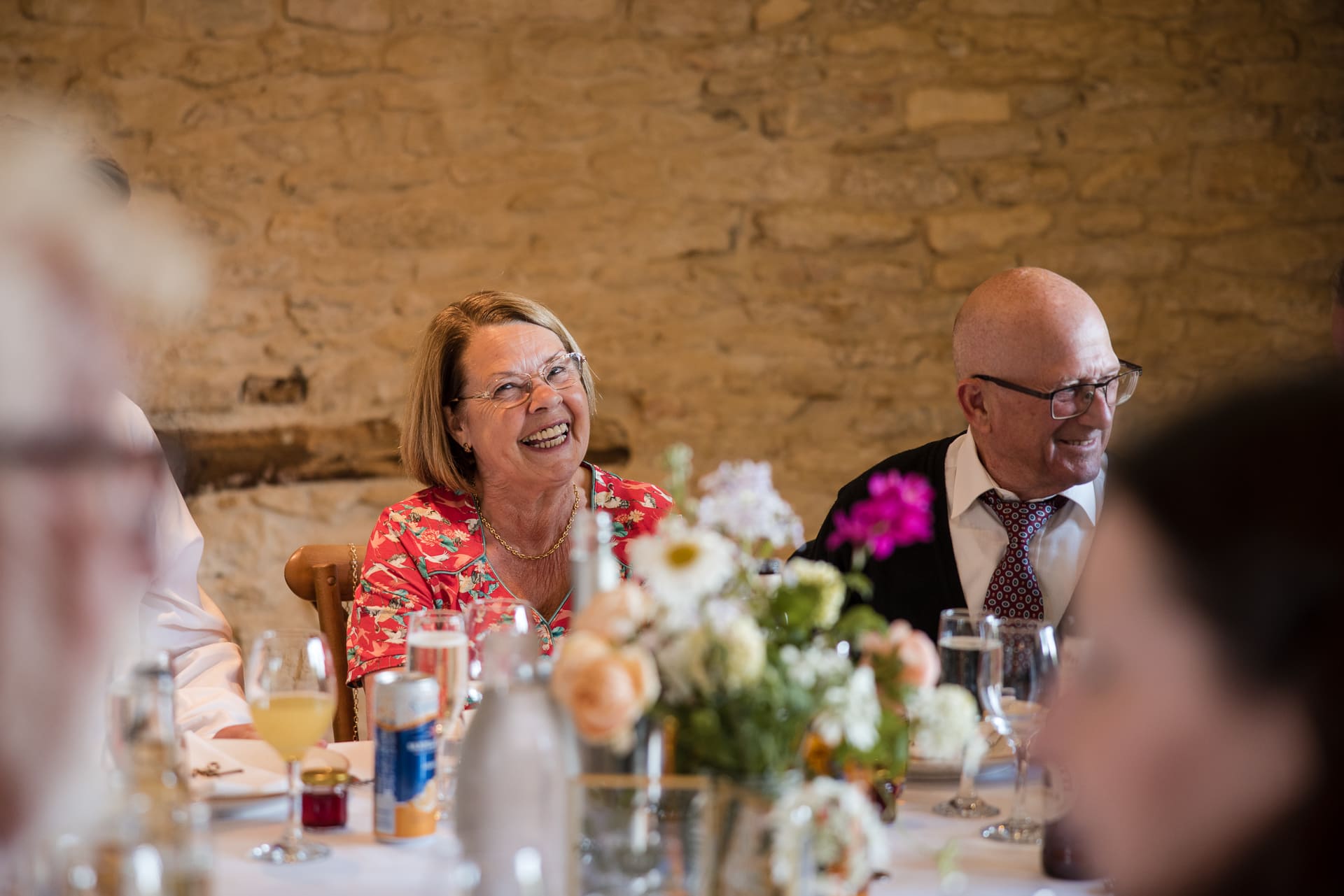Laughing guest at the wedding breakfast