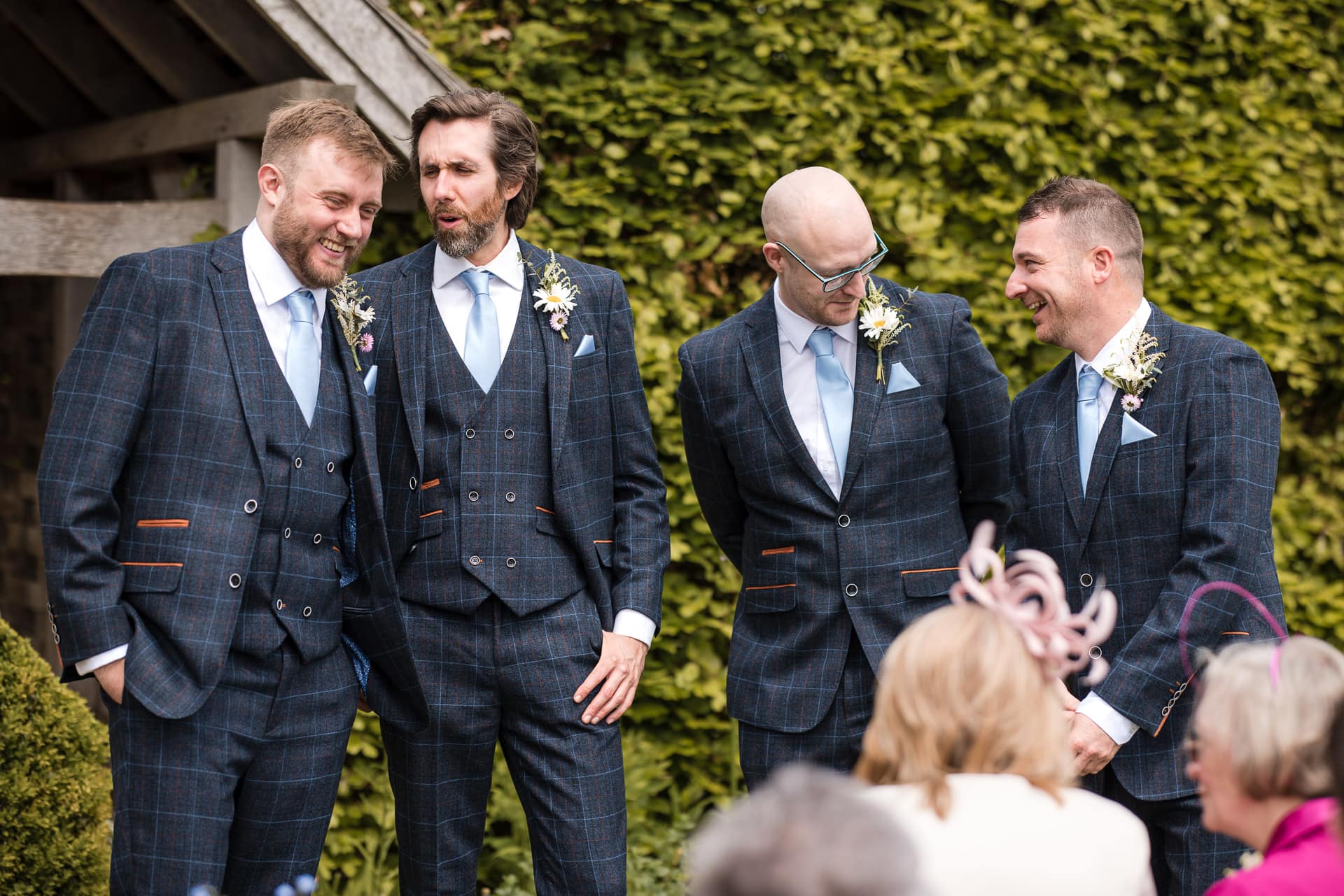 The Groom and the Groomsmen having a last minute laugh before the Ceremony.
