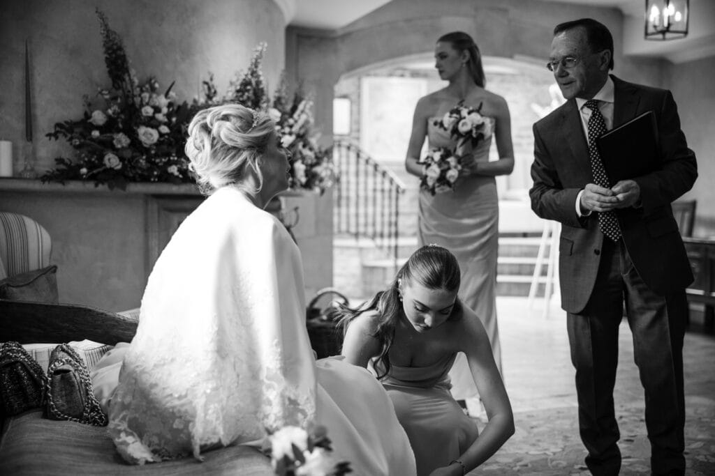 Bride talking to the Registrar at Le Manoir