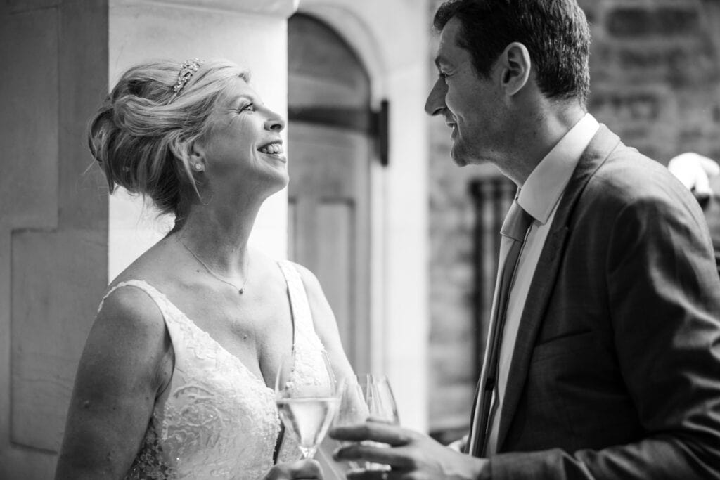 Bride talking to guests at Le Manoir