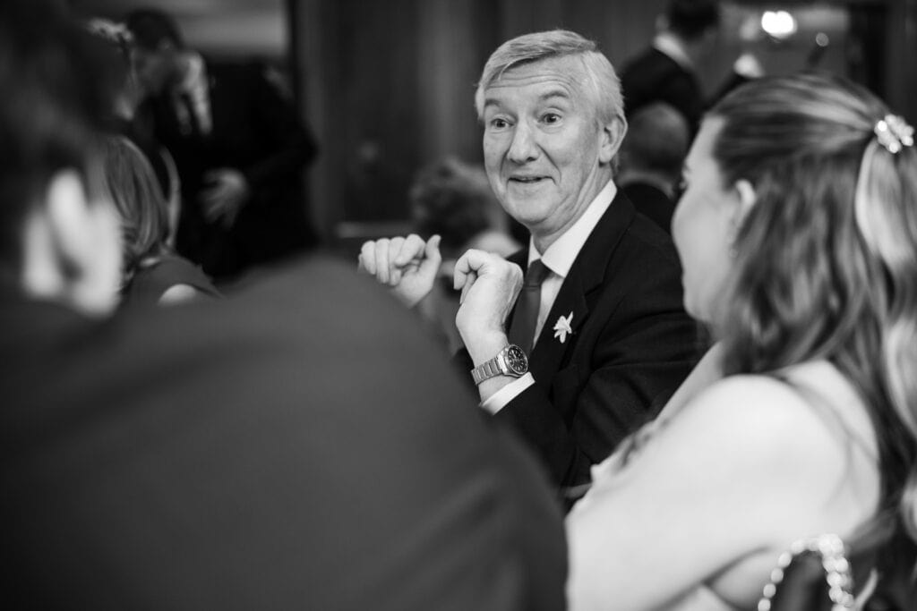 Guests chatting at the wedding breakfast