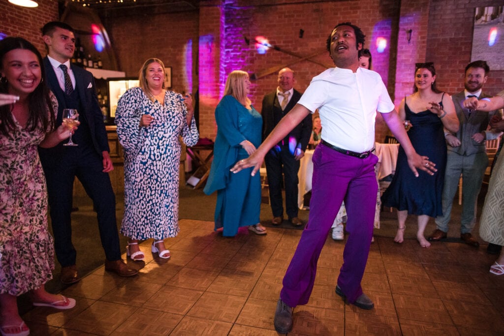 Wedding Guest taking centre stage on the dancefloor at the Cherwell Boathouse.