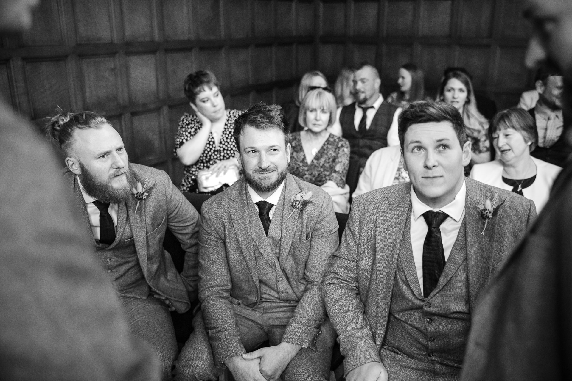 Groomsmen chatting with the Groom whilst waiting at Oxford County Hall