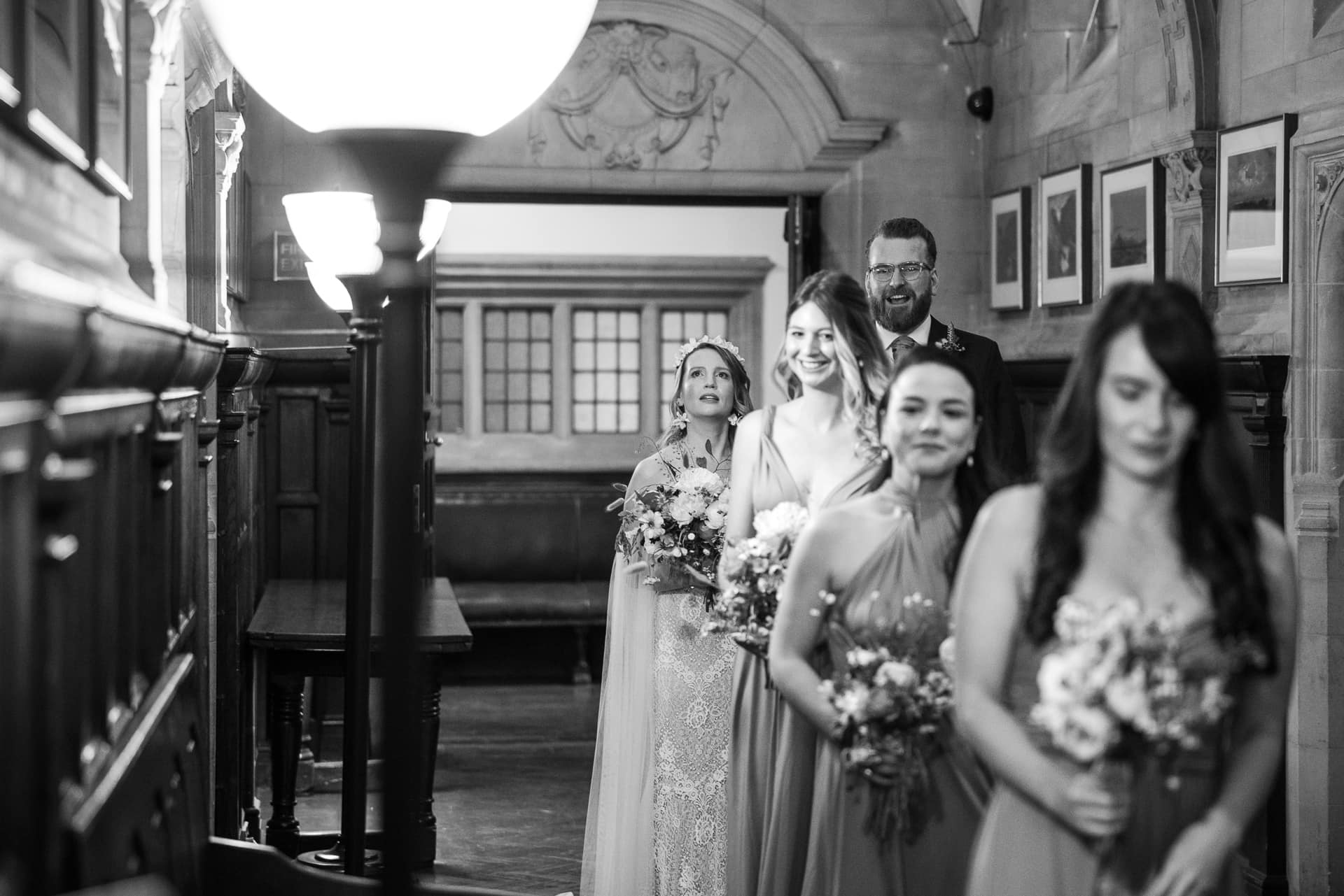 Bride and Bridesmaids waiting to enter the room at Oxfords county hall
