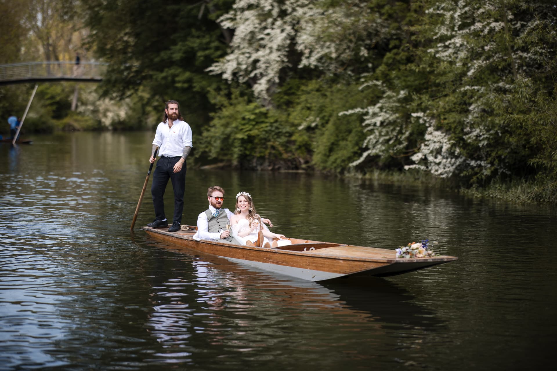Bride and Groom on a punt, on the River Cherwell for a wedding at the Cherwell Boathouse
