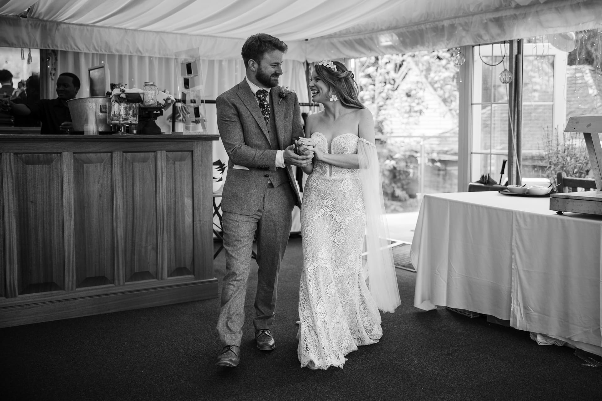 Bride and Groom walk into the room at the Cherwell Boathouse