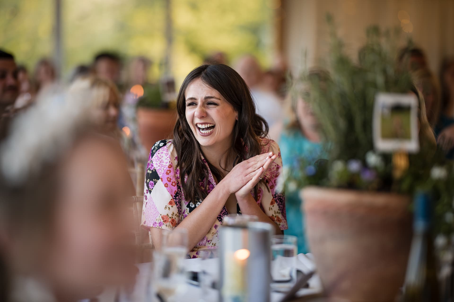 Guest laughing at the speeches at the Cherwell Boathouse Wedding