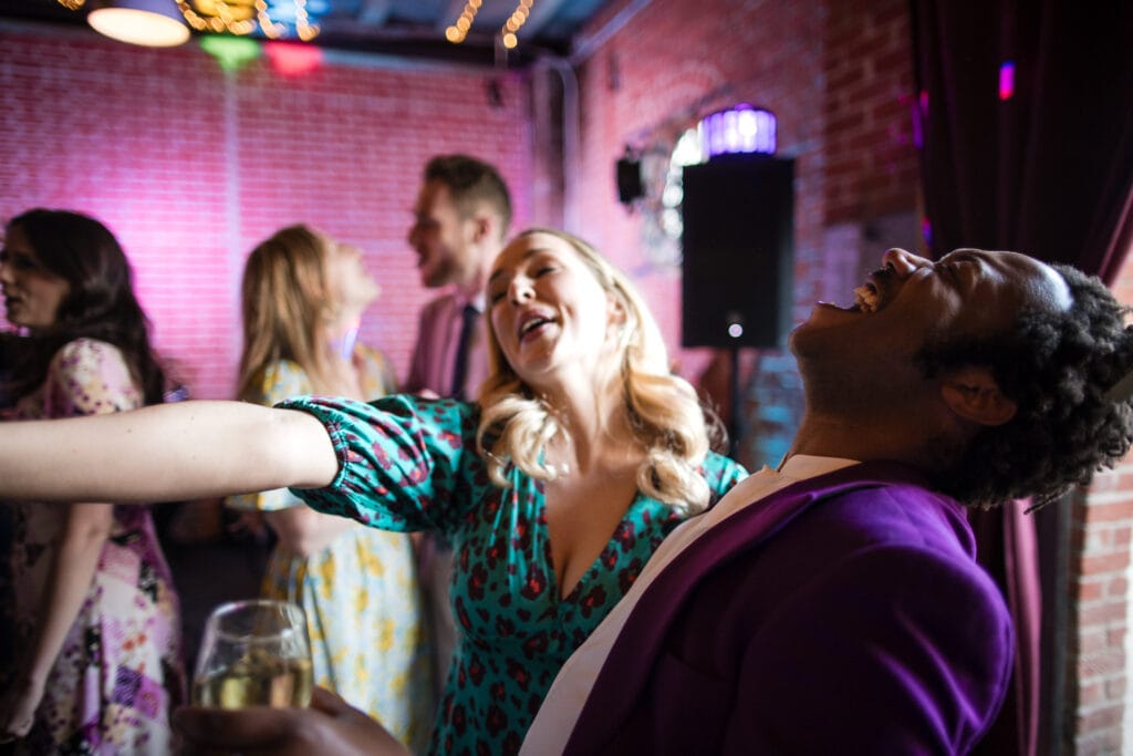 Two guests dancing at a Cherwell Boathouse Wedding