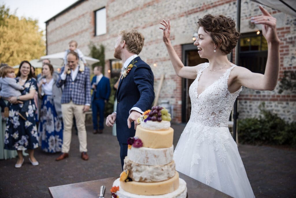 Cutting the cake at the Gathering Barn