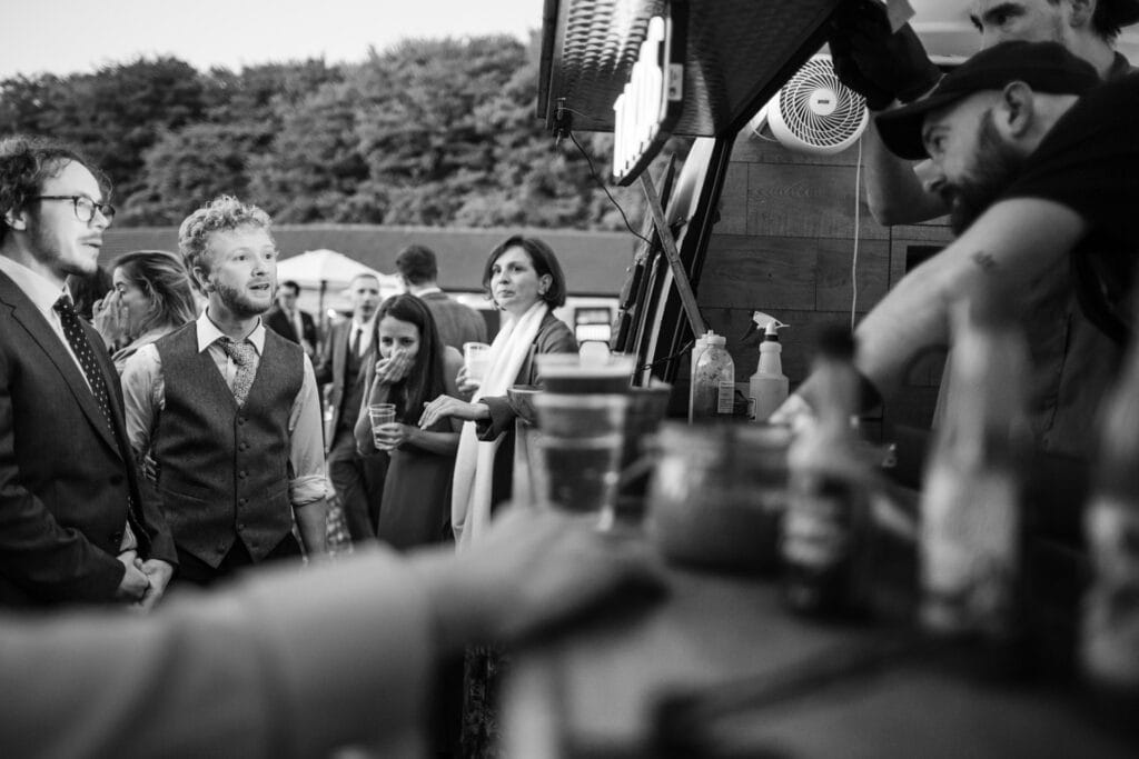 Groom enjoying evening guest Tacos.