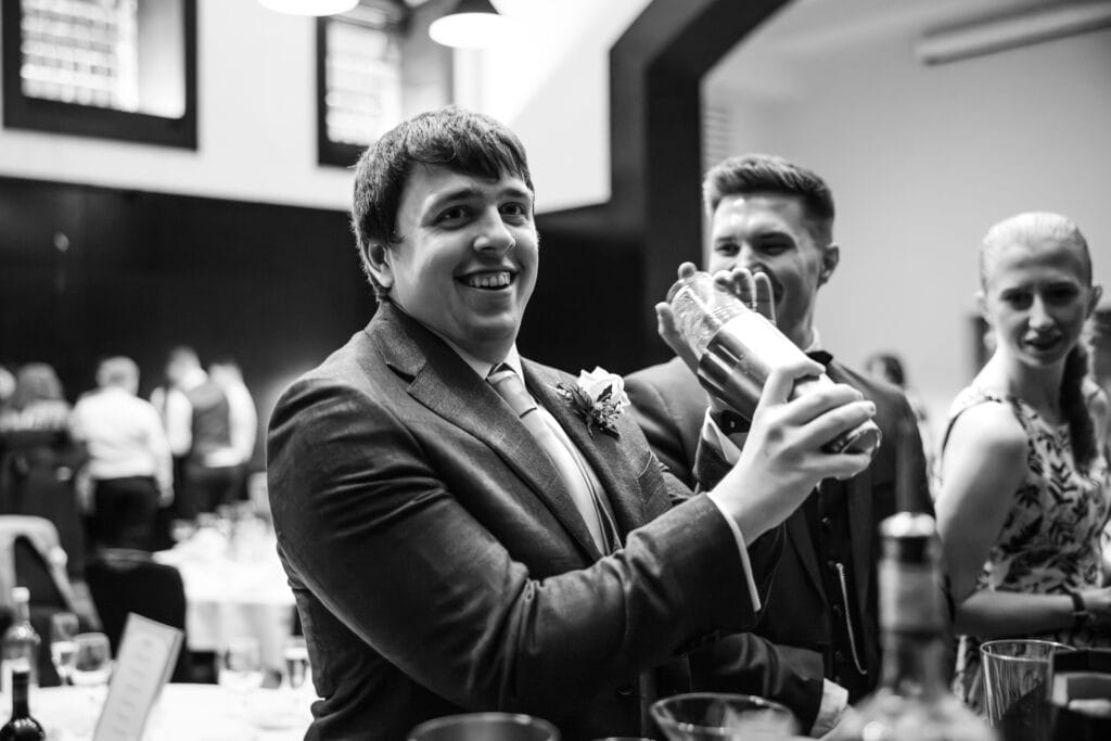 Groom with a cocktail shaker