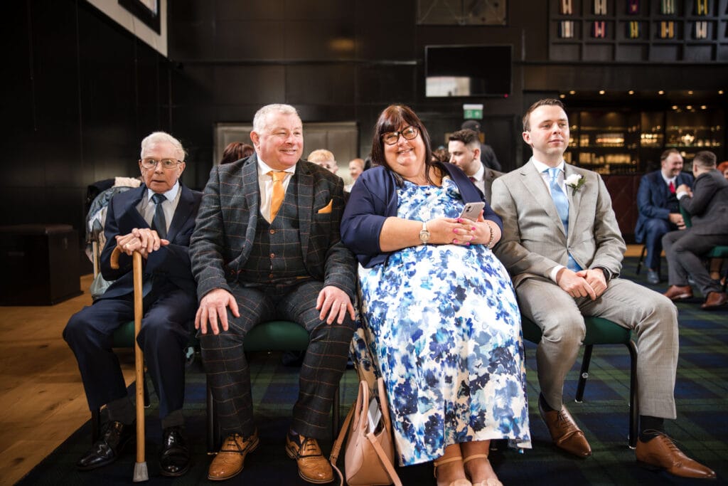 Family and best man watching on at the Malmaison Oxford