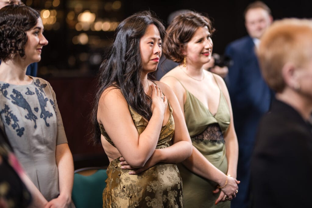 Guests looking on at the wedding in the Malmaison Oxford
