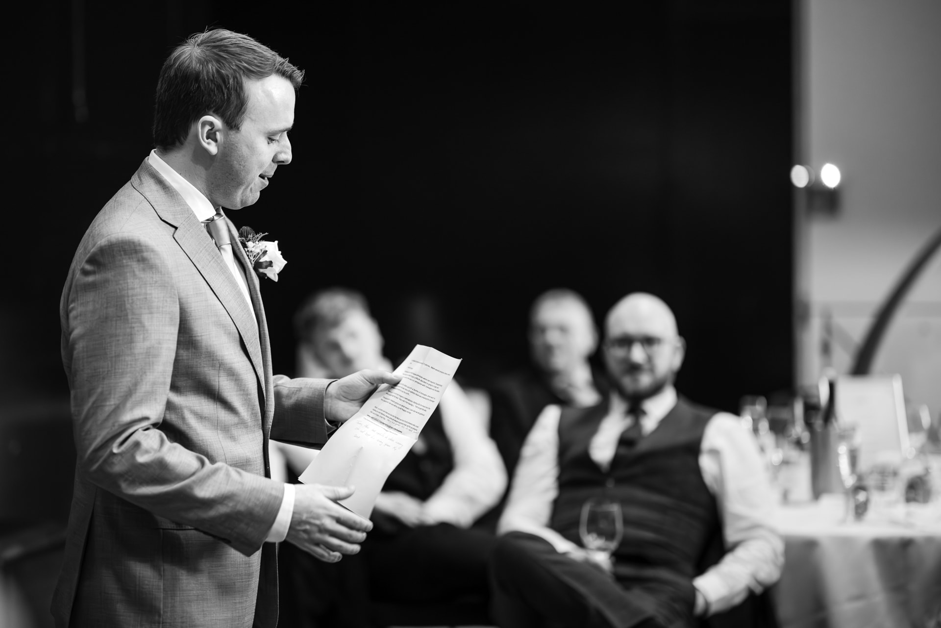 Best man reading with guests looking on at the Malmaison Oxford