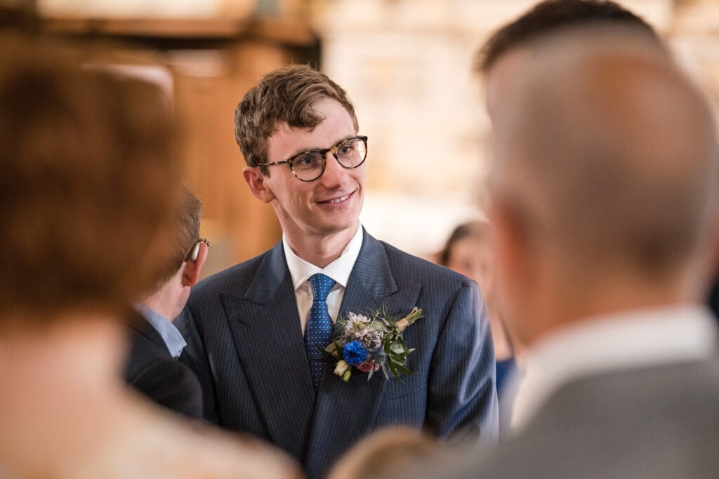 The Groom listening to his guests at an Oxford Wedding