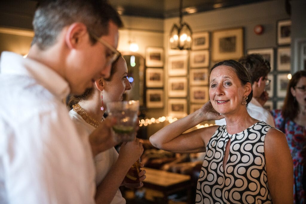 Wedding Guests chatting at the St Aldates Tavern.