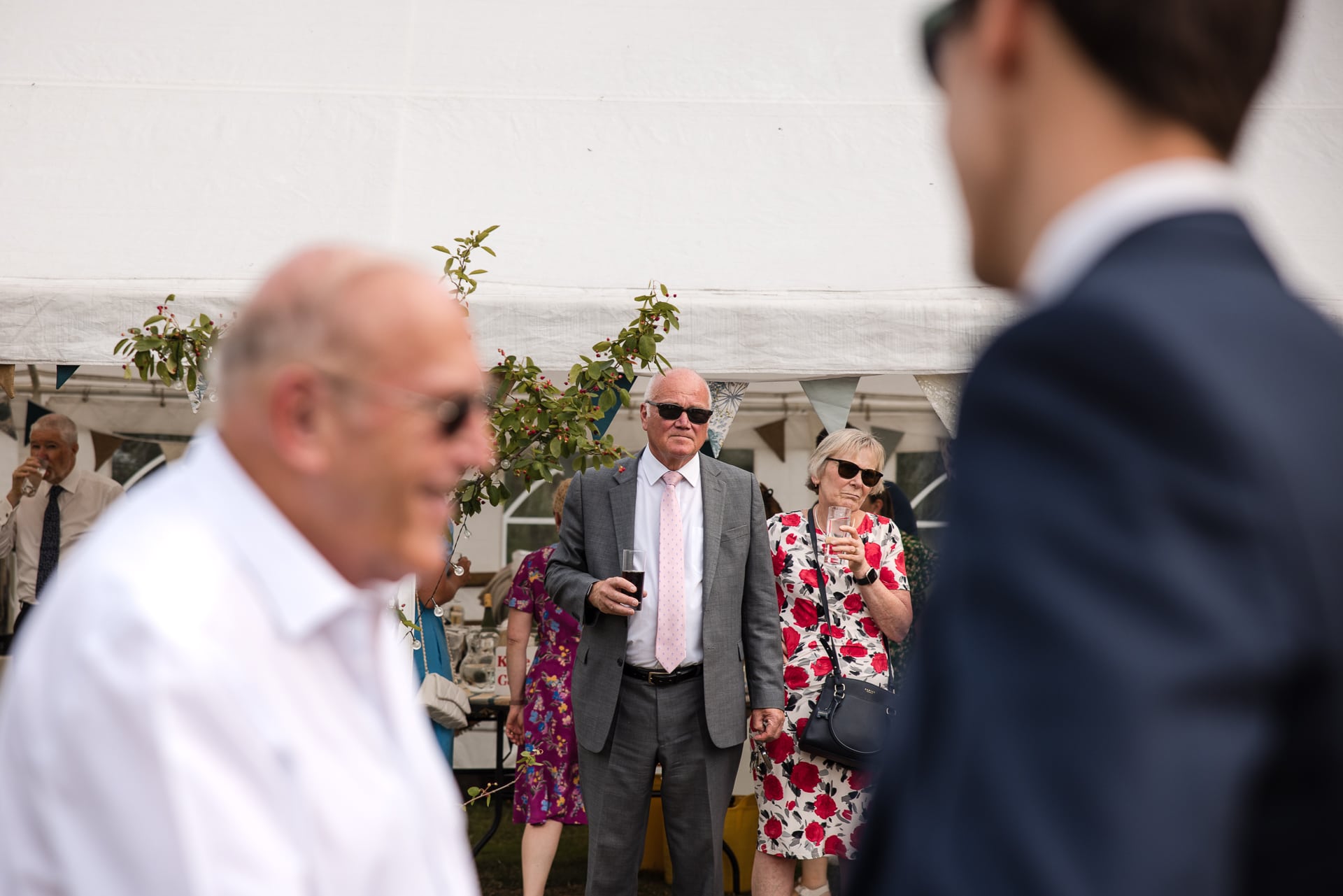 Old Couple with dark shades on at the Sandhurst Farm Wedding Reception