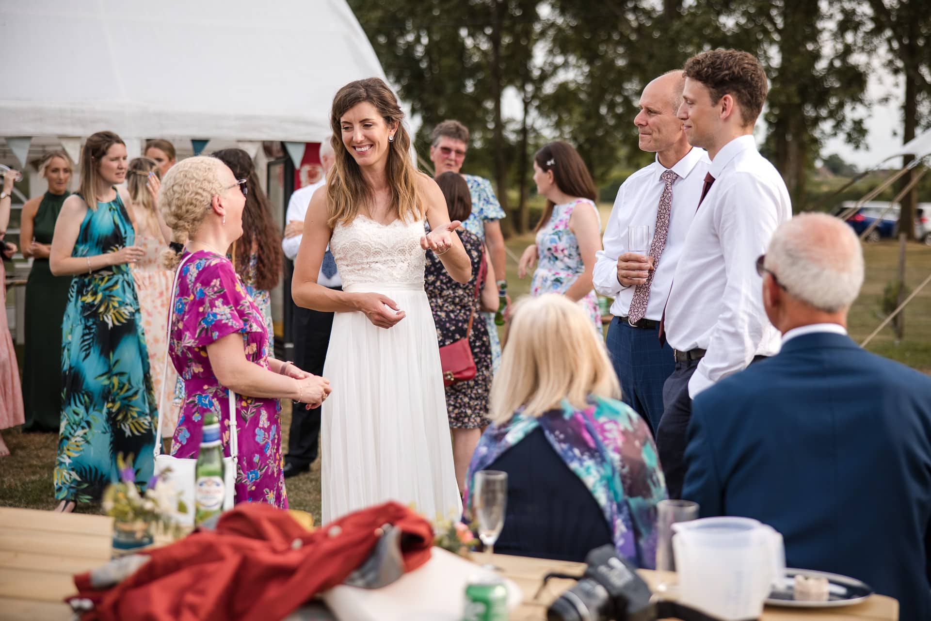 Bride talking with Guests at the Sandhurst Farm Wedding Reception