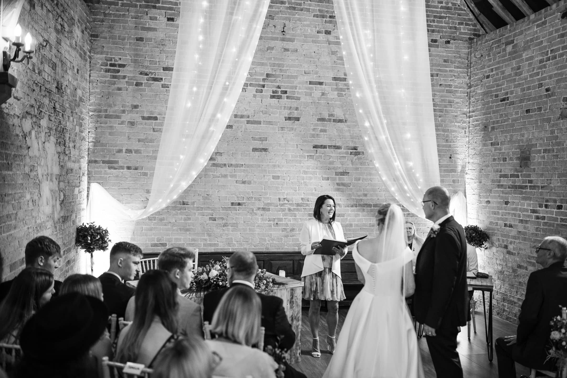 Bride and Groom being married at Dovecote Barn