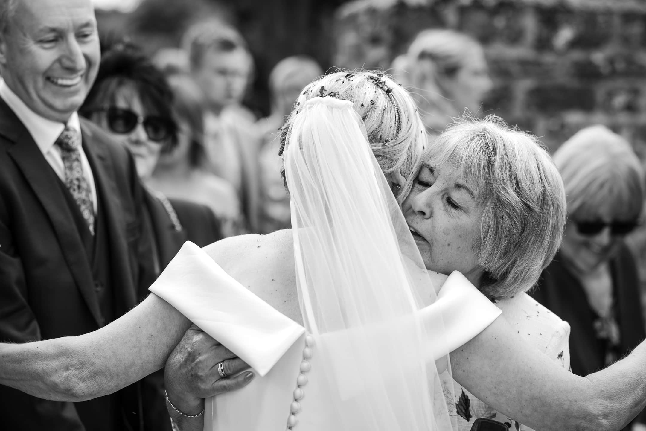 Congratulating the bride at Dovecote Barn Wedding