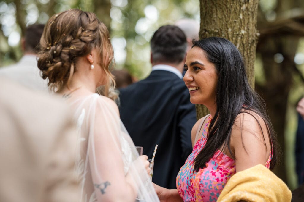 Bride talking to friends