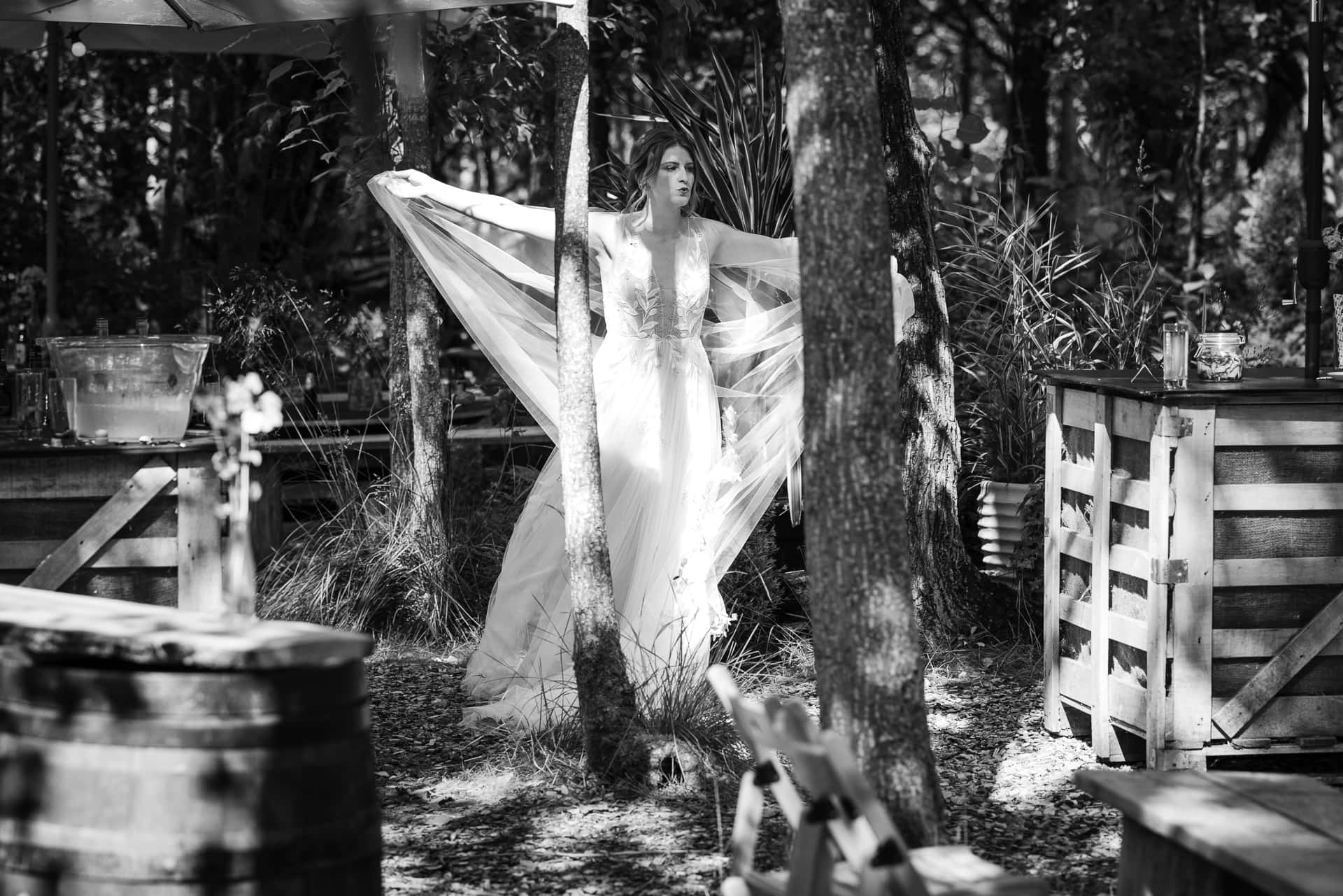 Bride just relaxing around the trees at the Endeavour Woodland wedding venue