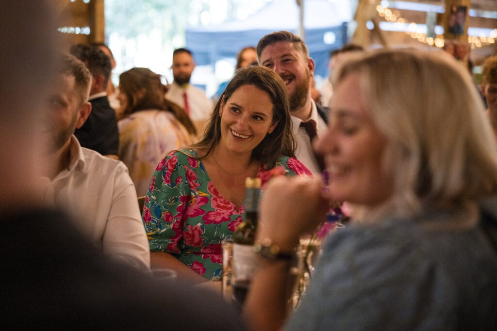 Guests enjoying the speeches at the Endeavour Woodland wedding venue