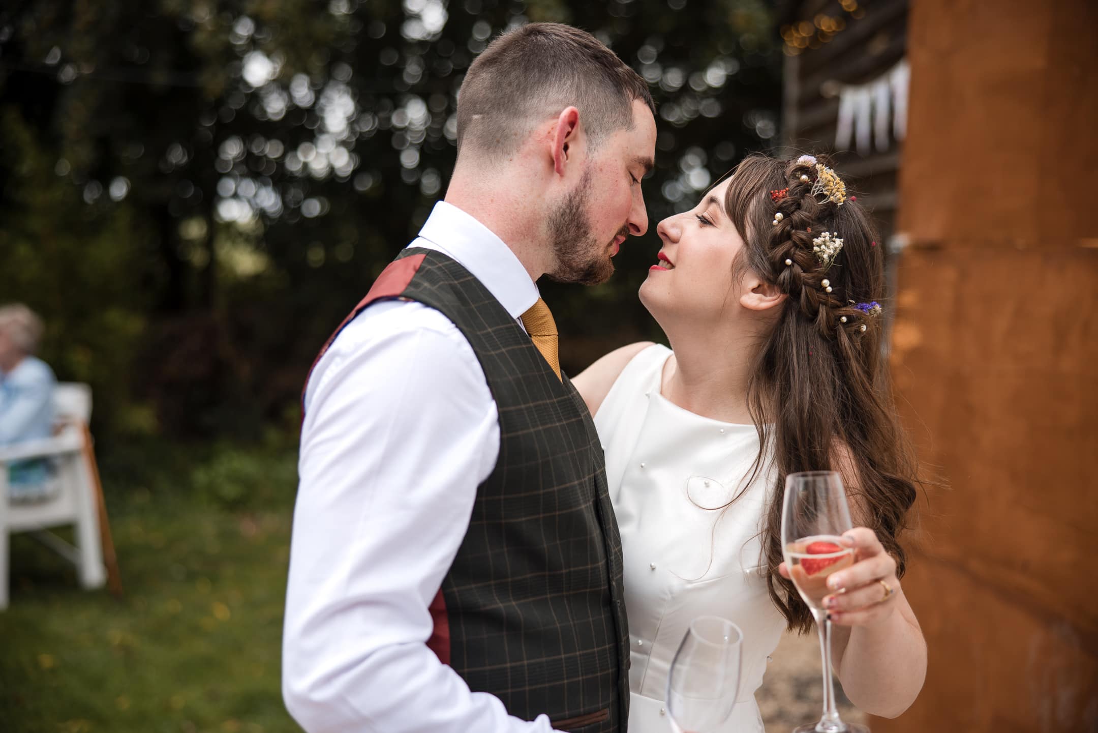 Bride and Groom about to kiss at the Acorn Barn