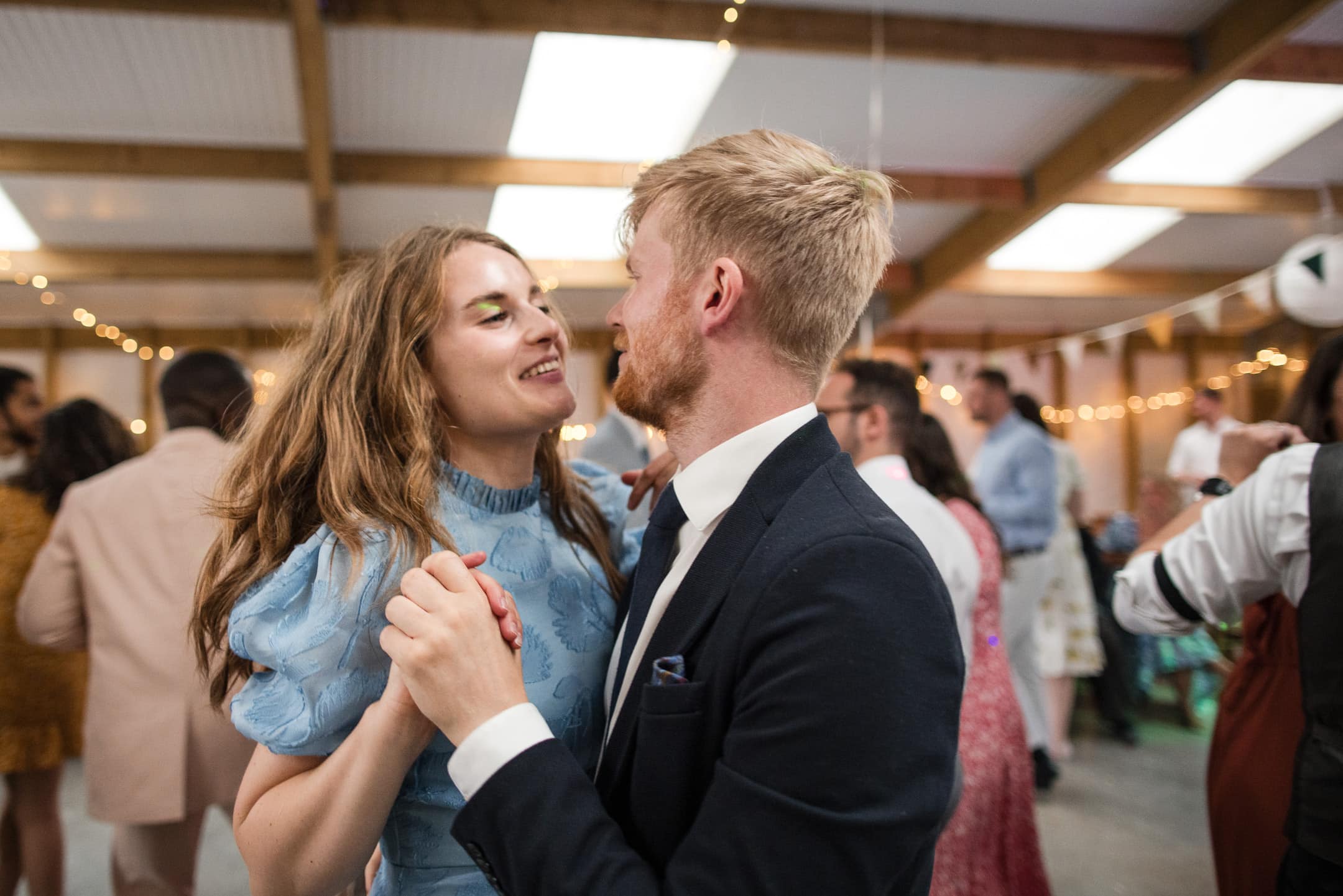 Couple dancing at the Acorn Barn Wedding Venue