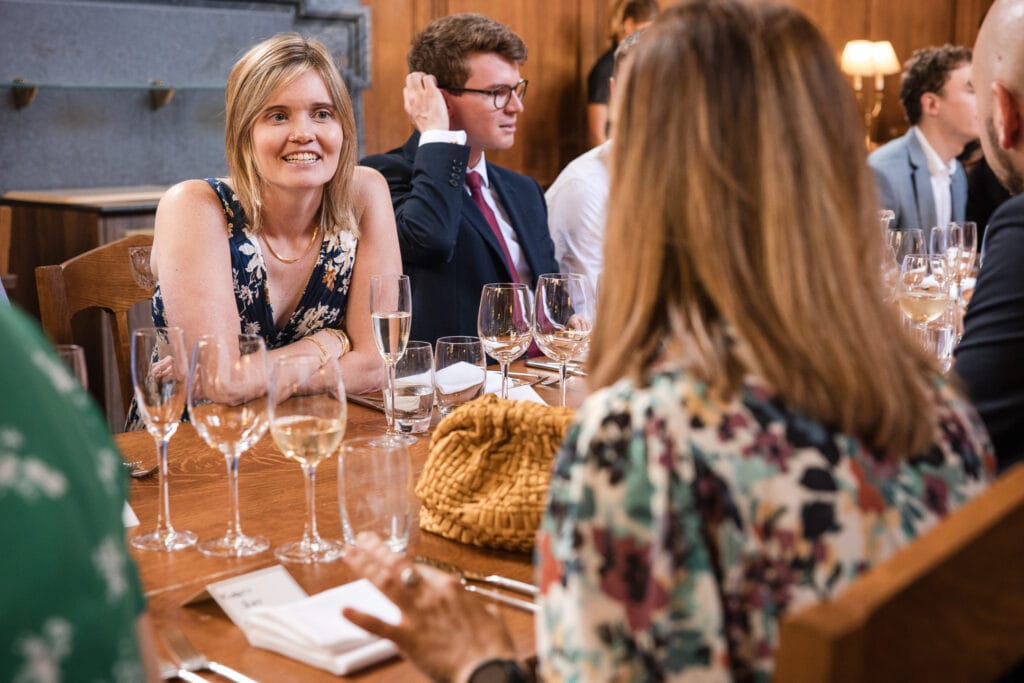 Guests chatting over drinks during Wedding breakfast