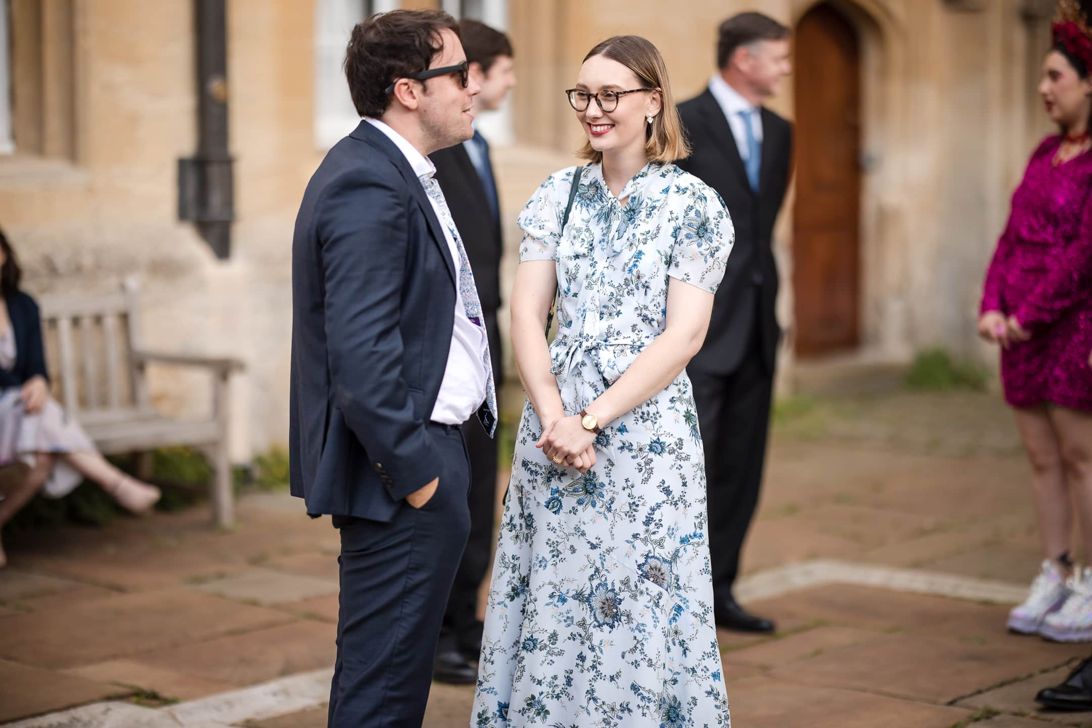 Guests talking at Corpus Christi College Oxford Wedding