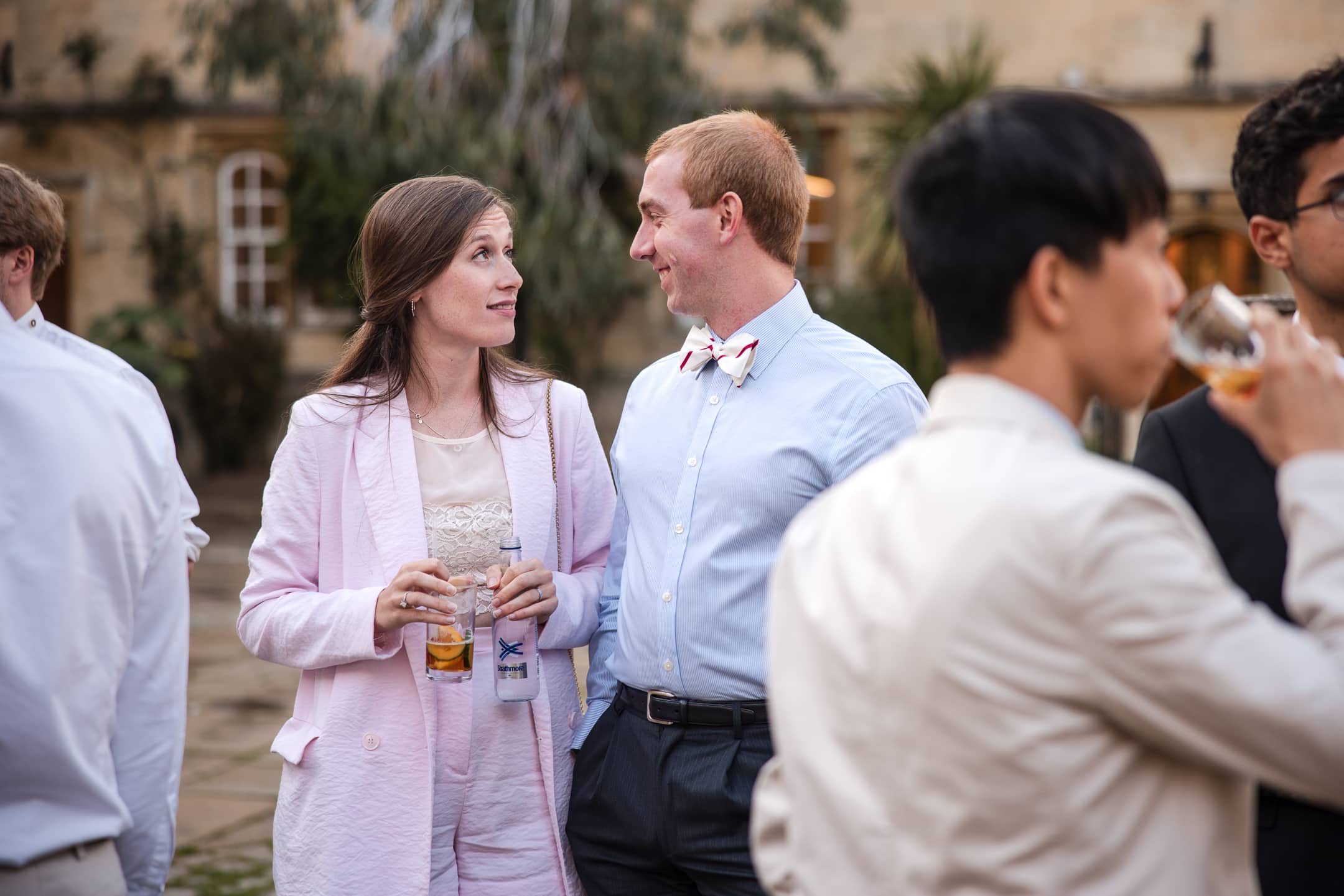Couple looking into each others eyes at Corpus Christi College Oxford Wedding