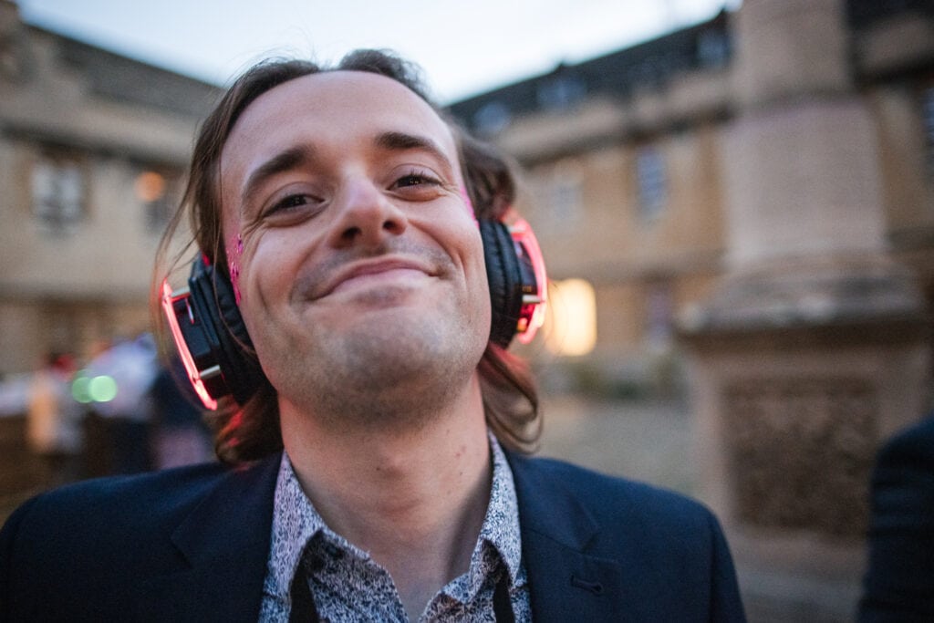 Bestman enjoying the silent disco at a Corpus Christi College Oxford Wedding