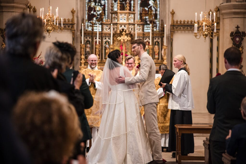First kiss at St Mary Magdalen Church Oxford wedding ceremony